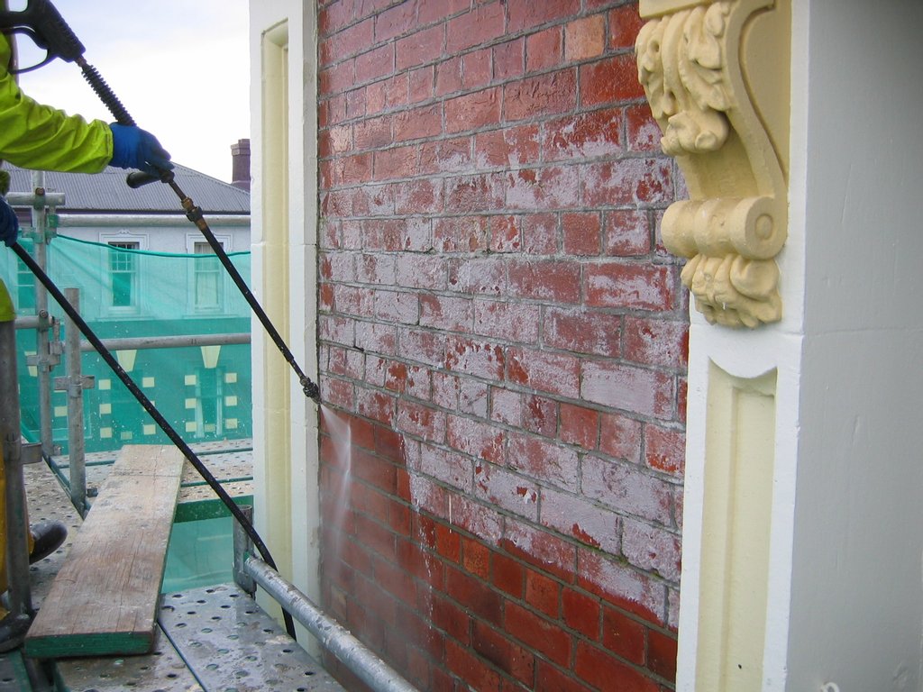 The red brick of the building was coated with a clear glaze approximately 10 years ago. The glaze was holding moisture in the bricks and creating a mould build up on the inside of the buildings walls. JetX used our paint stripping techniques, removing the old glaze without harming the red bricks or the mortar.